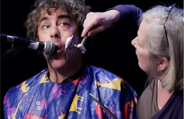 Michael at the microphone during a show