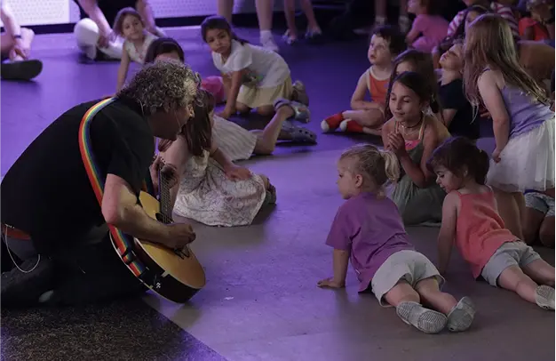 Little ones dancing with Michael at a preschool show